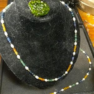 Natural sapphire and pearl set with 24 k gold clasp toggle. Very classy !